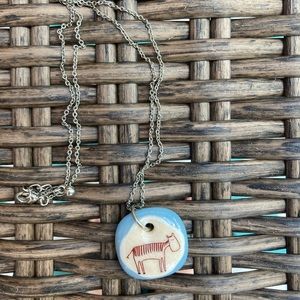 Whimsical creature necklace